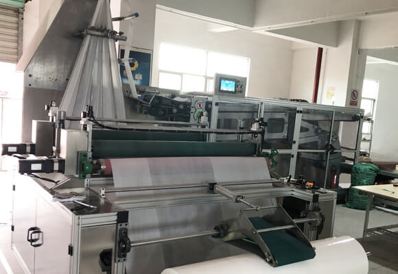 Production process of disposable seat cover machine